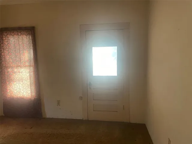 a view of elevator with hallway