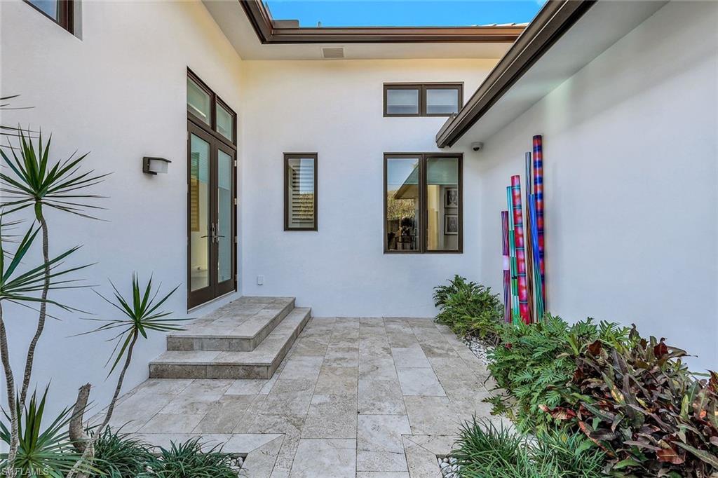 2296 Hawks Ridge Loop Naples, FL 34105 - Photo 23 of 50 Second outdoor space.