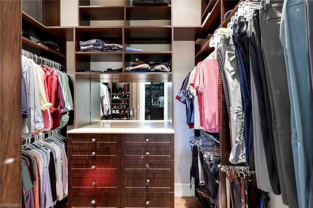 2296 Hawks Ridge Loop Naples, FL 34105 - Photo 26 of 50 Second walk-in closet with automatic lighting.