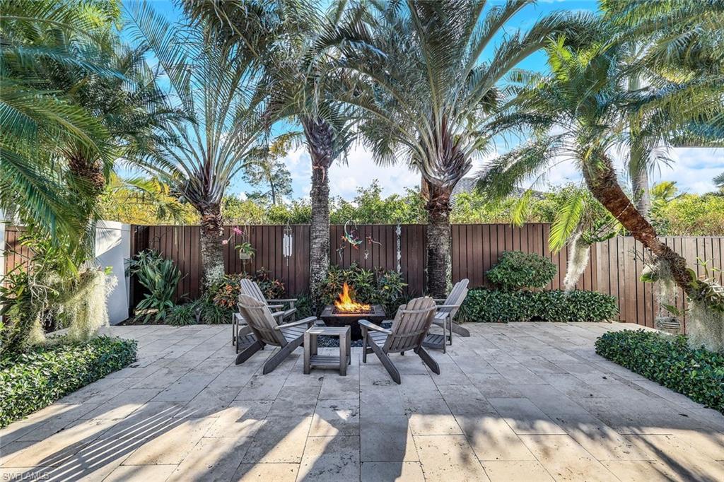 2296 Hawks Ridge Loop Naples, FL 34105 - Photo 48 of 50 Firepit in the courtyard
