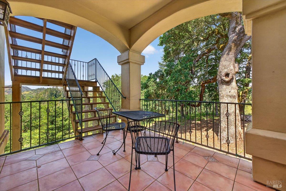 13404 Flora Ranch Road Healdsburg, CA 95448 - Photo 44 of 83 a view of a chairs and table in the balcony