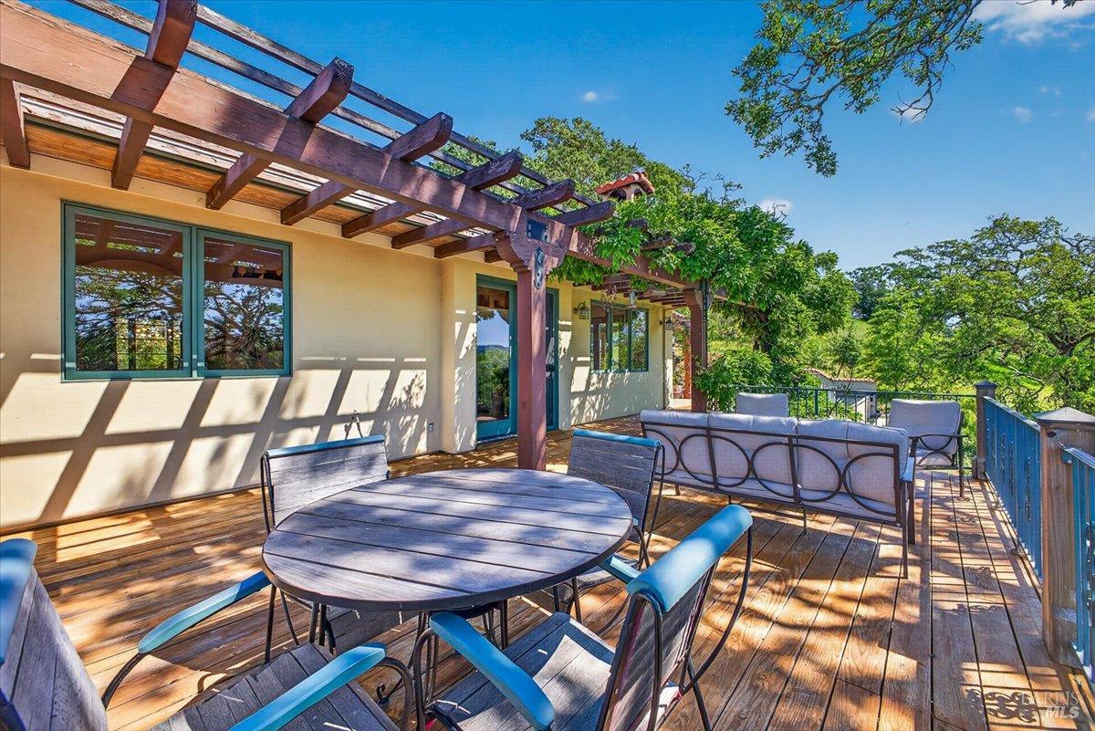 13404 Flora Ranch Road Healdsburg, CA 95448 - Photo 63 of 83 a view of a patio with a table and chairs