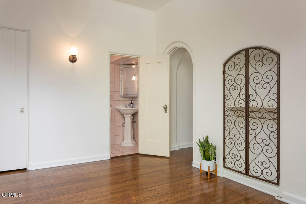 2452 Boulder Road Altadena, CA 91001 - Photo 12 of 33 an empty room with wooden floor and windows