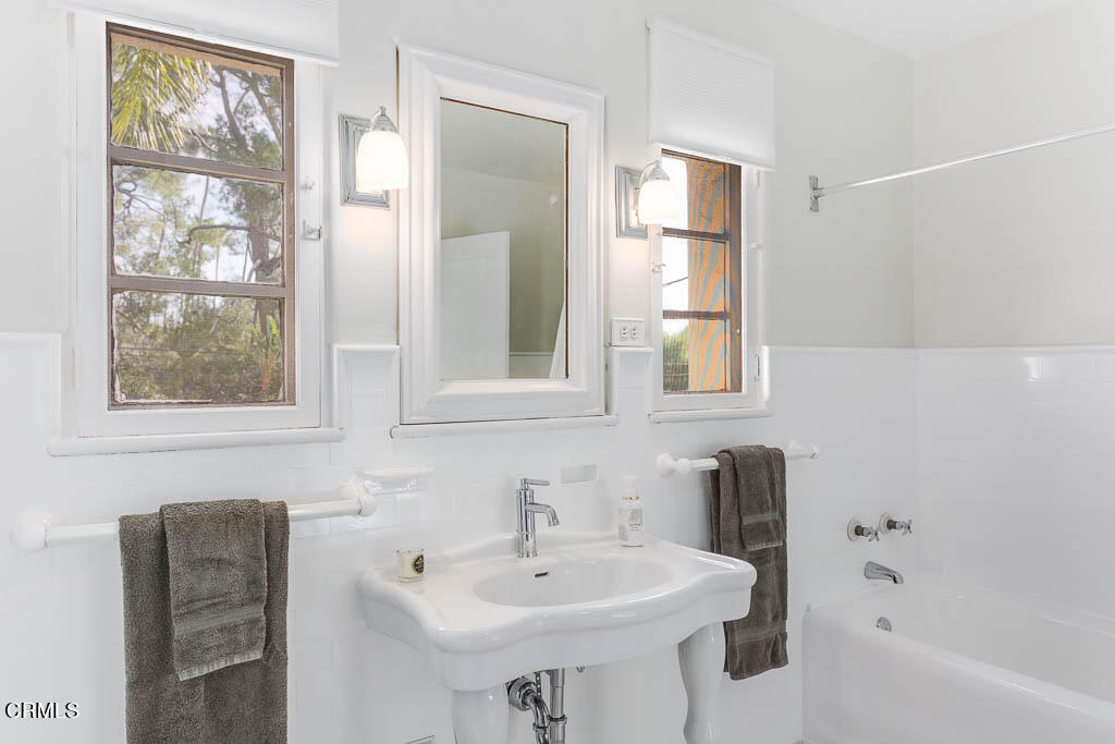 2452 Boulder Road Altadena, CA 91001 - Photo 21 of 33 a bathroom with a sink and a mirror