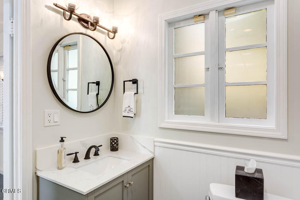 2452 Boulder Road Altadena, CA 91001 - Photo 24 of 33 a bathroom with a sink and a mirror