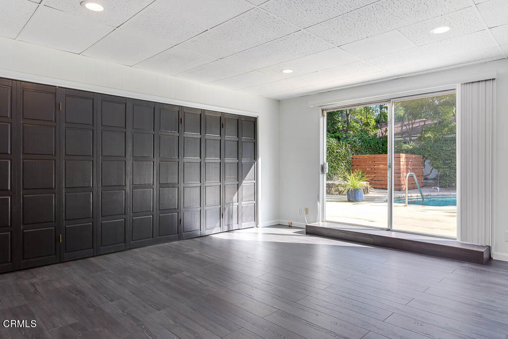 2452 Boulder Road Altadena, CA 91001 - Photo 26 of 33 wooden floor in an empty room with a window