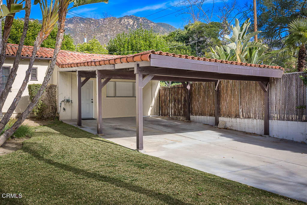 2452 Boulder Road Altadena, CA 91001 - Photo 32 of 33 a view of a house with a yard and floor to ceiling window