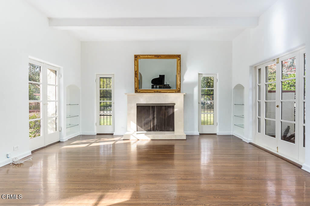 2452 Boulder Road Altadena, CA 91001 - Photo 9 of 33 a view of an empty room with window and wooden floor