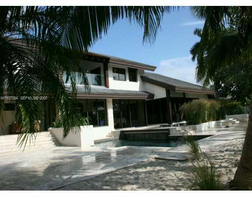 700 Lake Road Miami, FL 33137 - Photo 1 of 12 a front view of a house with a yard