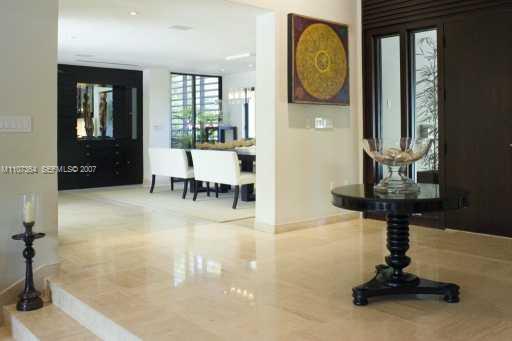 700 Lake Road Miami, FL 33137 - Photo 6 of 12 a living room with furniture and a large window