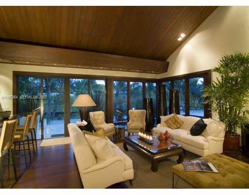 700 Lake Road Miami, FL 33137 - Photo 7 of 12 a living room with furniture and a large window