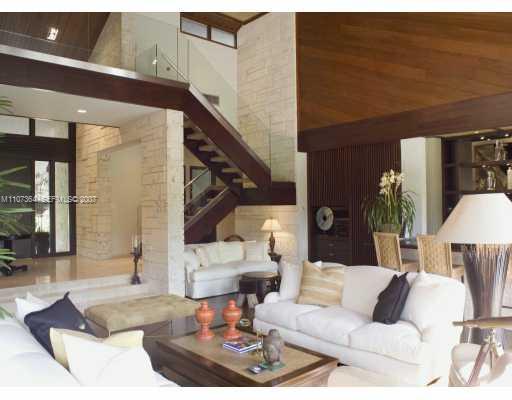 700 Lake Road Miami, FL 33137 - Photo 8 of 12 a living room with furniture and a lamp