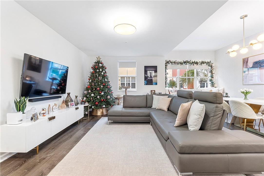 2330 Vintage Drive Lighthouse Point, FL 33064 - Photo 11 of 41 a living room with furniture and a flat screen tv