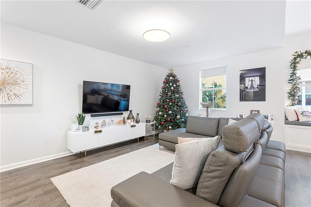 2330 Vintage Drive Lighthouse Point, FL 33064 - Photo 12 of 41 a living room with furniture and a flat screen tv
