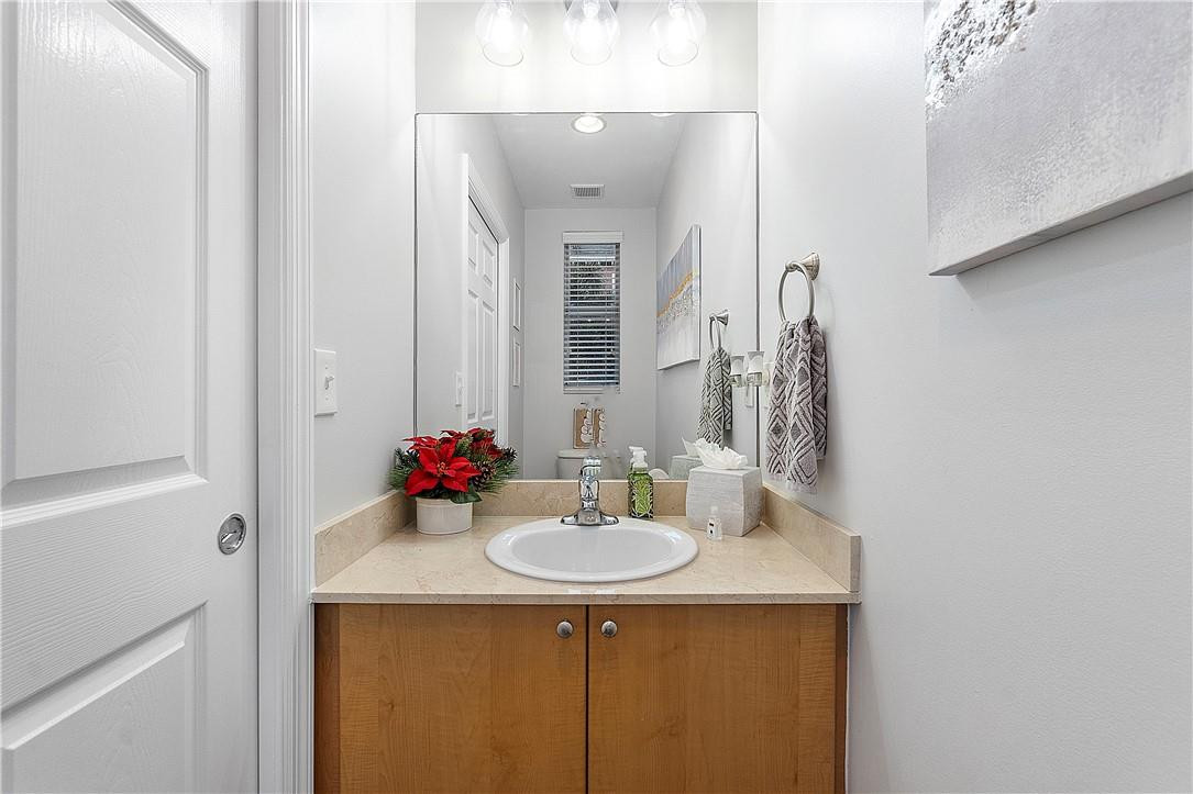 2330 Vintage Drive Lighthouse Point, FL 33064 - Photo 19 of 41 a bathroom with a sink and a mirror