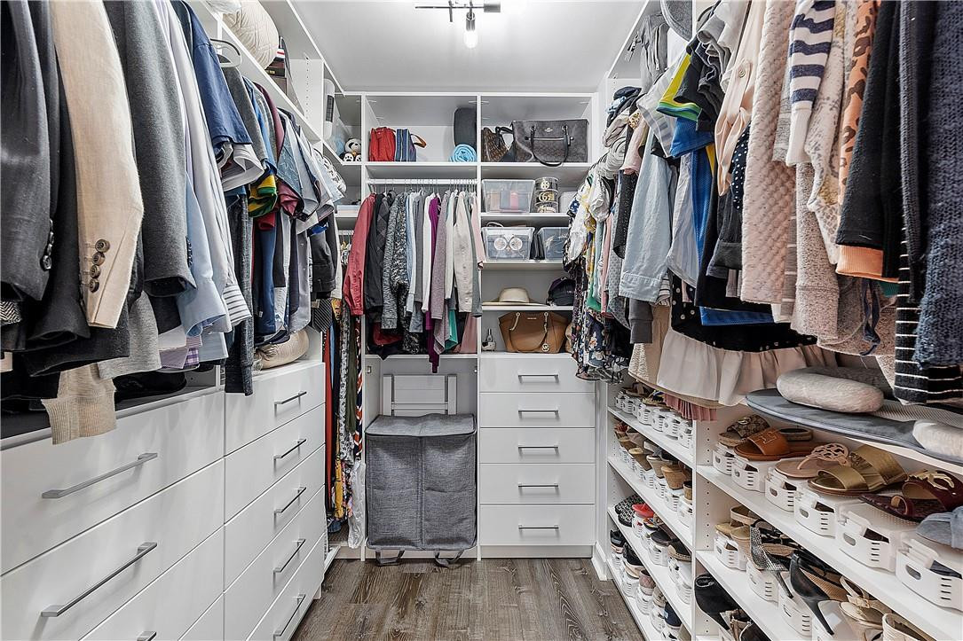 2330 Vintage Drive Lighthouse Point, FL 33064 - Photo 21 of 41 a view of walk in closet with clothes and shoes