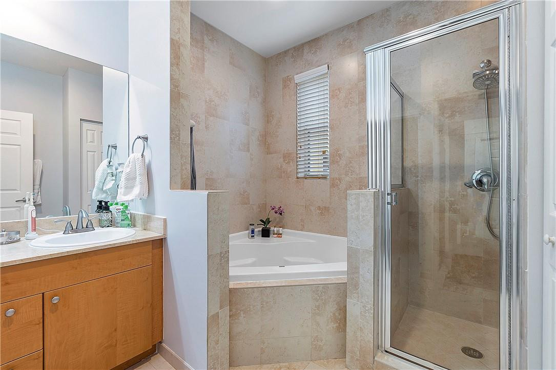 2330 Vintage Drive Lighthouse Point, FL 33064 - Photo 23 of 41 a bathroom with a sink and a mirror