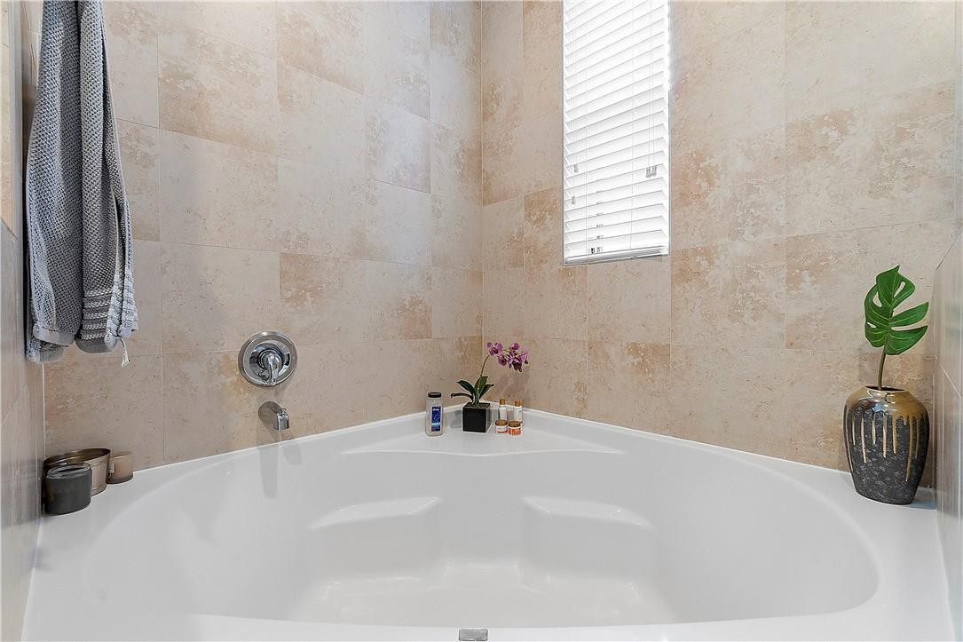 2330 Vintage Drive Lighthouse Point, FL 33064 - Photo 24 of 41 a bathroom with a tub