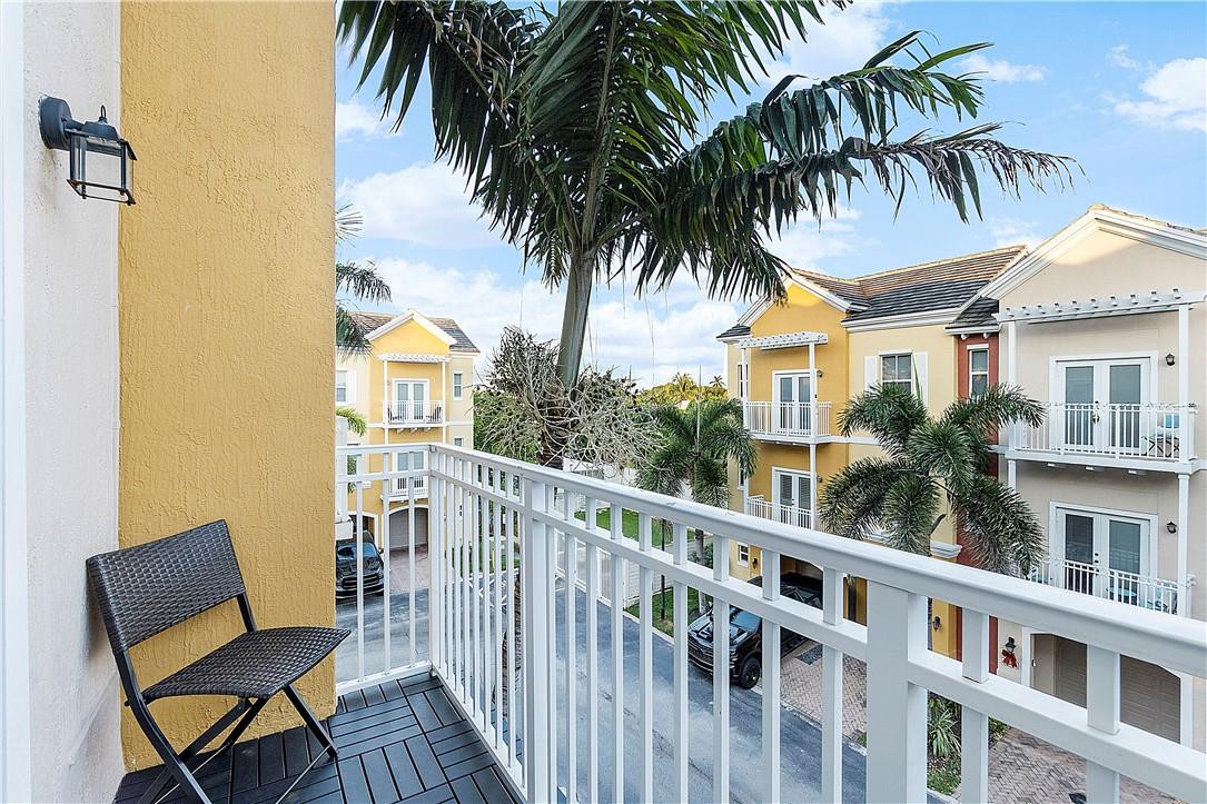 2330 Vintage Drive Lighthouse Point, FL 33064 - Photo 30 of 41 a balcony of a house with outdoor seating