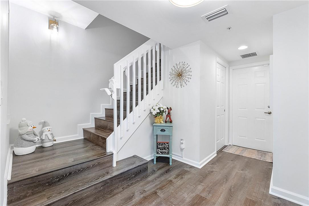 2330 Vintage Drive Lighthouse Point, FL 33064 - Photo 5 of 41 a view of entryway and hall with wooden floor