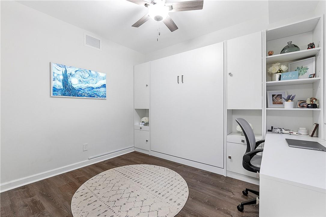 2330 Vintage Drive Lighthouse Point, FL 33064 - Photo 6 of 41 a view of workspace with wooden floor and cabinet