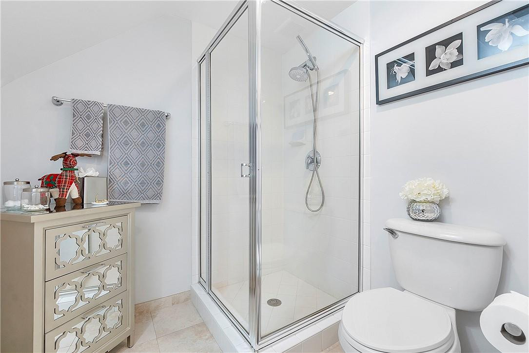 2330 Vintage Drive Lighthouse Point, FL 33064 - Photo 9 of 41 a white toilet sitting next to a bathroom sink