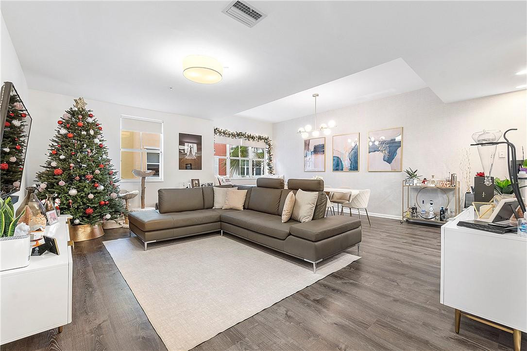 2330 Vintage Drive Lighthouse Point, FL 33064 - Photo 10 of 41 a living room with furniture and a christmas tree