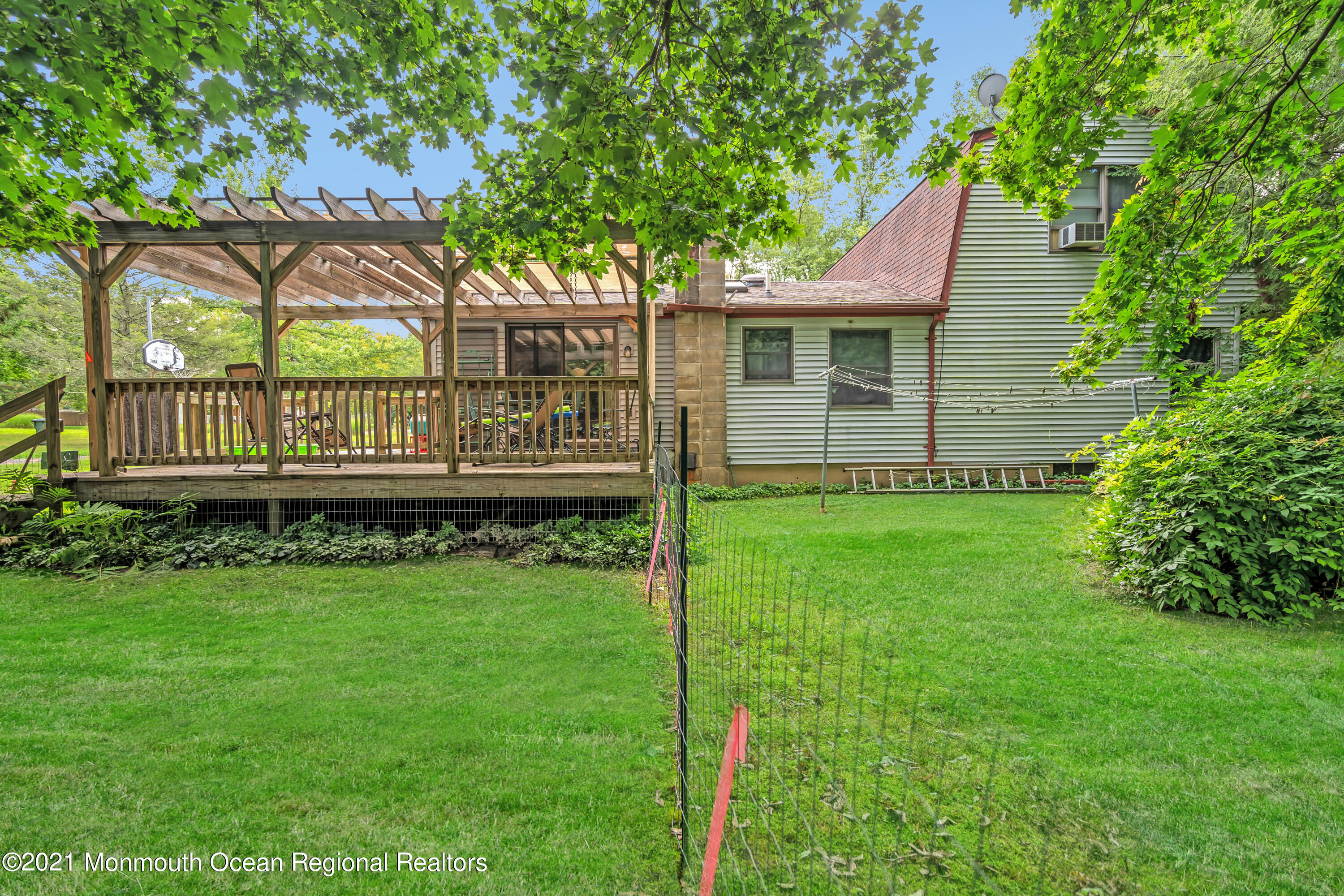580 Hyson Road Jackson, NJ 08527 - Photo 25 of 45 a view of a house with a yard and sitting area