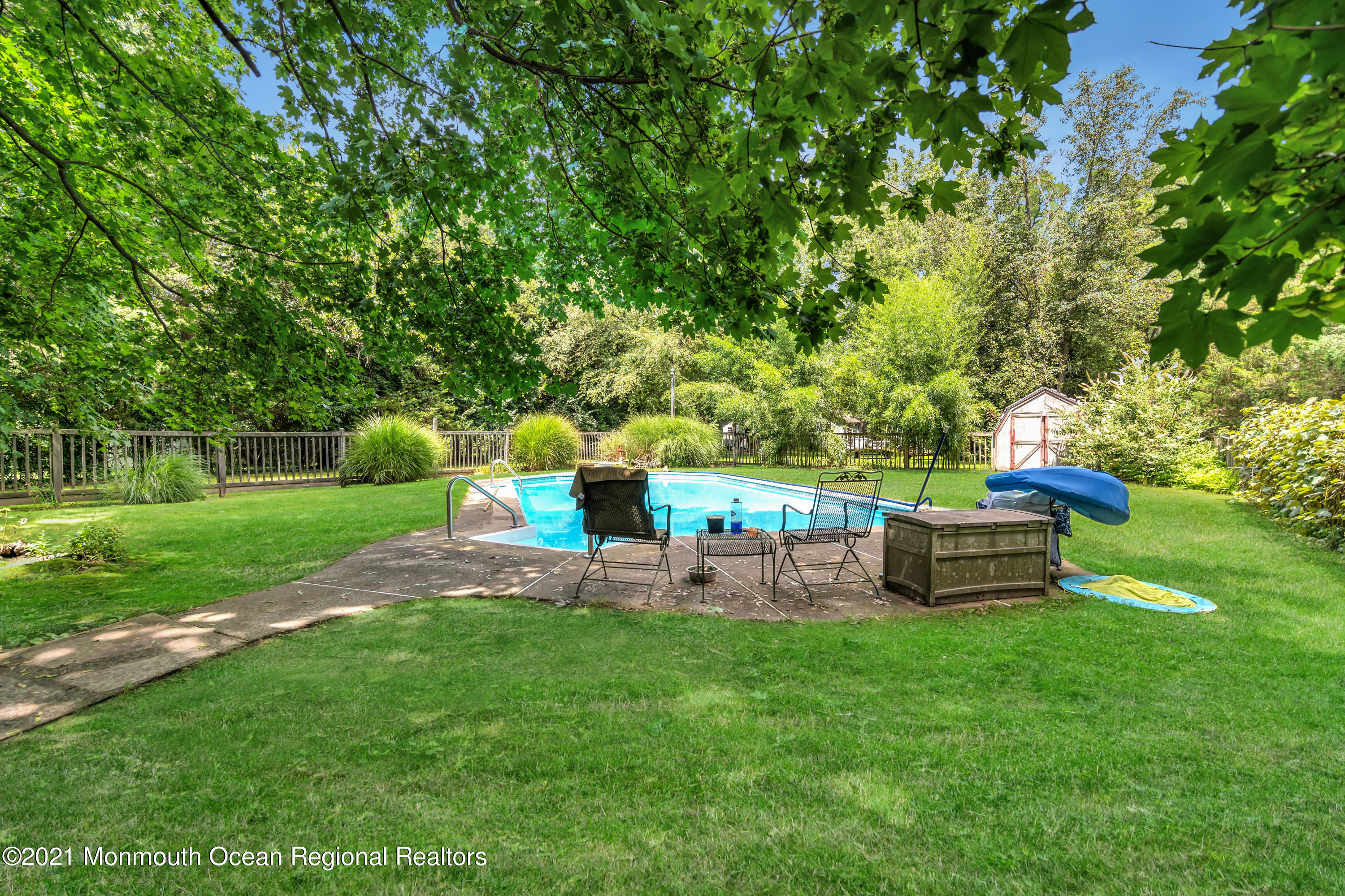 580 Hyson Road Jackson, NJ 08527 - Photo 26 of 45 a view of a garden with an outdoor seating