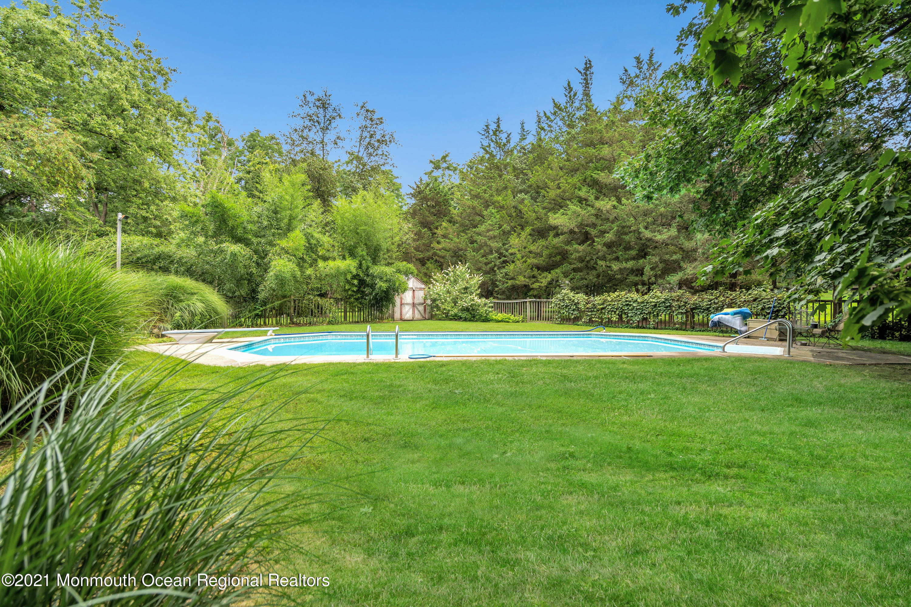 580 Hyson Road Jackson, NJ 08527 - Photo 31 of 45 a view of yard with swimming pool and green space