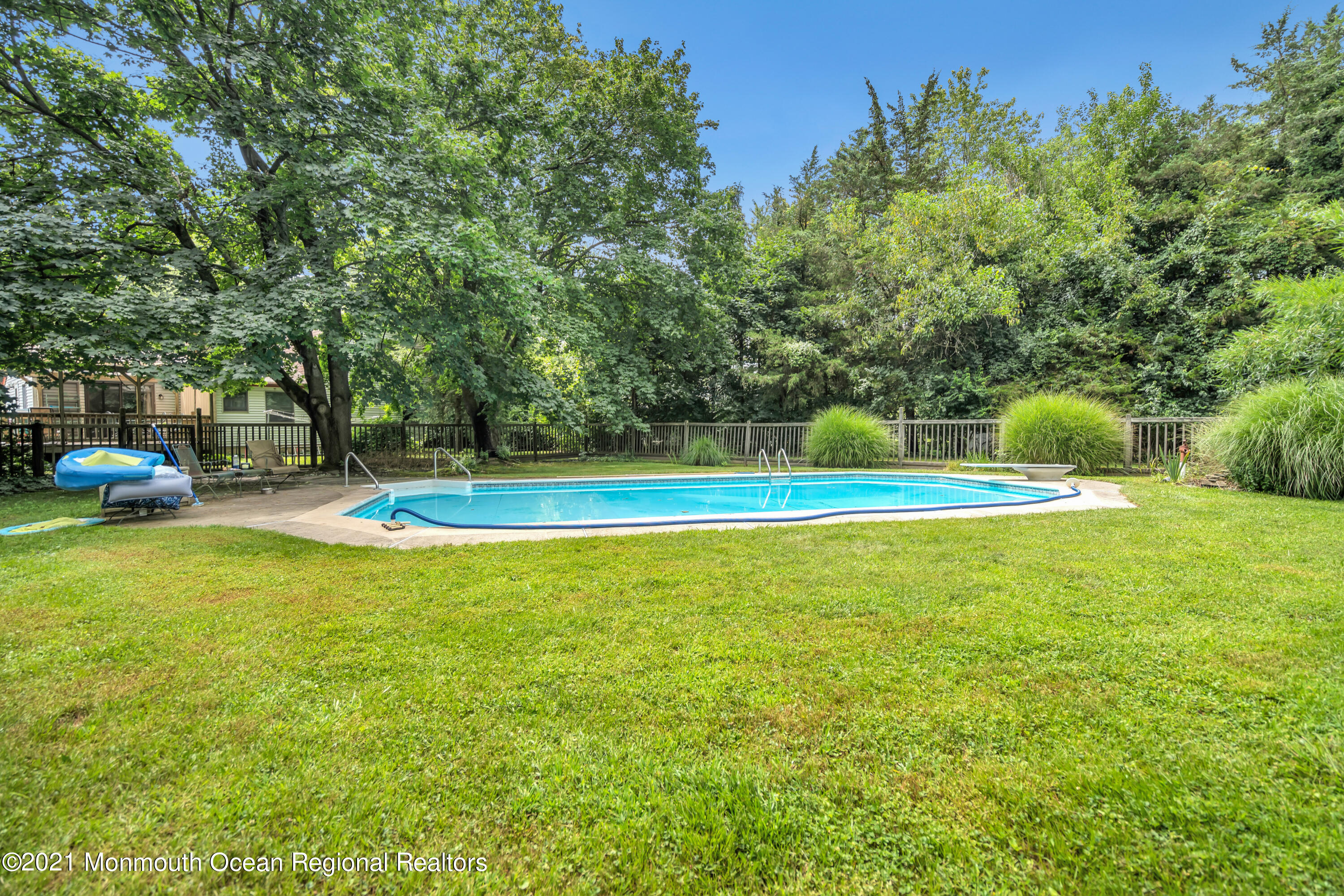 580 Hyson Road Jackson, NJ 08527 - Photo 36 of 45 a view of a swimming pool with an outdoor space and seating area