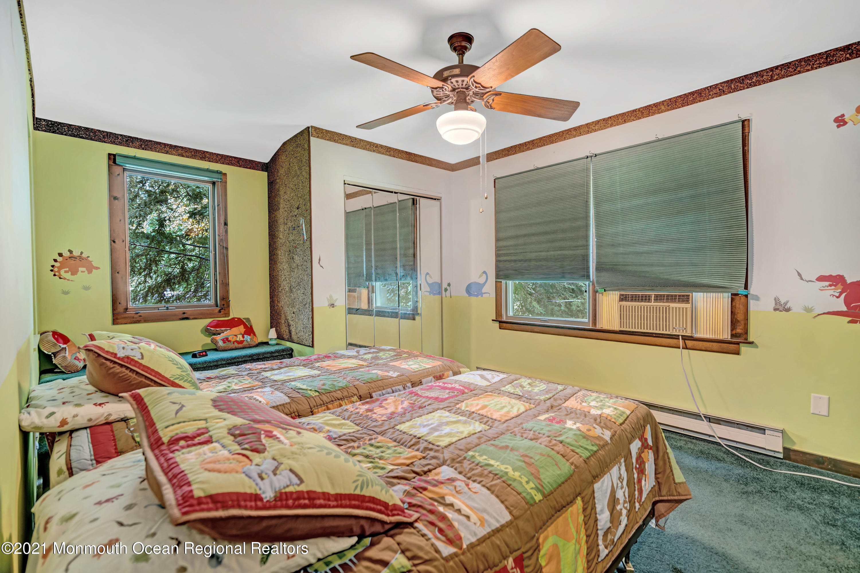 580 Hyson Road Jackson, NJ 08527 - Photo 39 of 45 a bedroom with a bed and a table