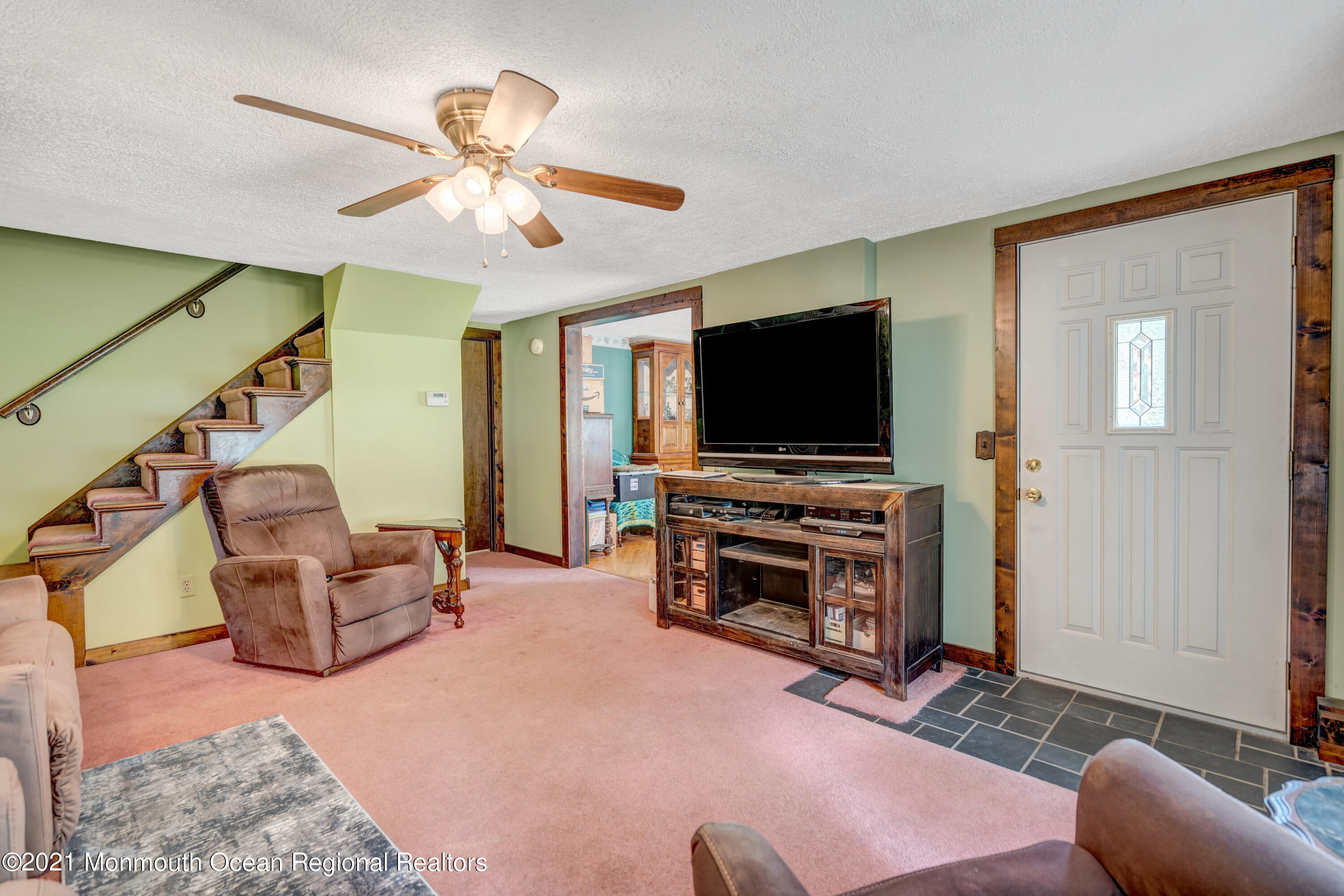 580 Hyson Road Jackson, NJ 08527 - Photo 10 of 45 a living room with furniture and a flat screen tv