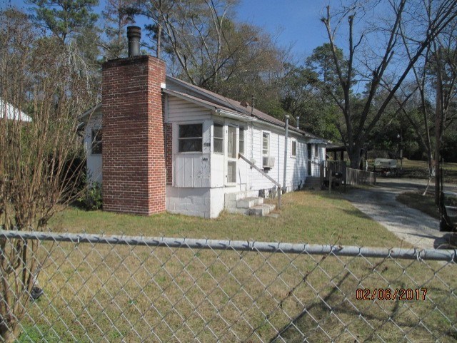 2661 New Clinton Road, Unit B17 Macon, GA 31211 - Photo 1 of 10 a view of a house with a yard