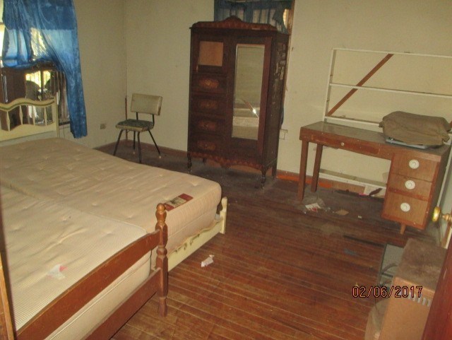 2661 New Clinton Road, Unit B17 Macon, GA 31211 - Photo 3 of 10 a bed sitting in a room next to a window