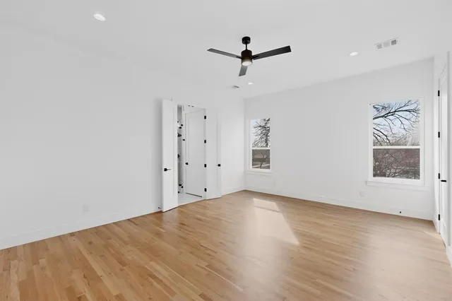 a bathroom with a double vanity sink a mirror and shower