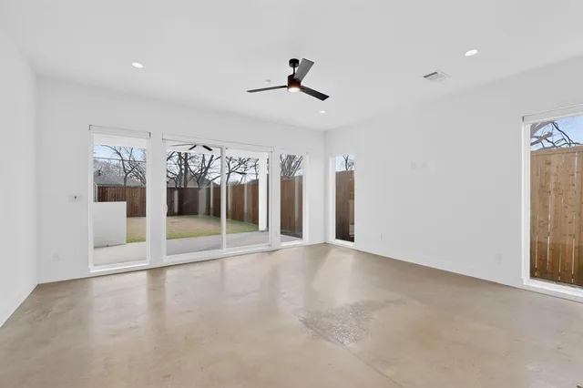 a view of a kitchen with a sink and cabinets