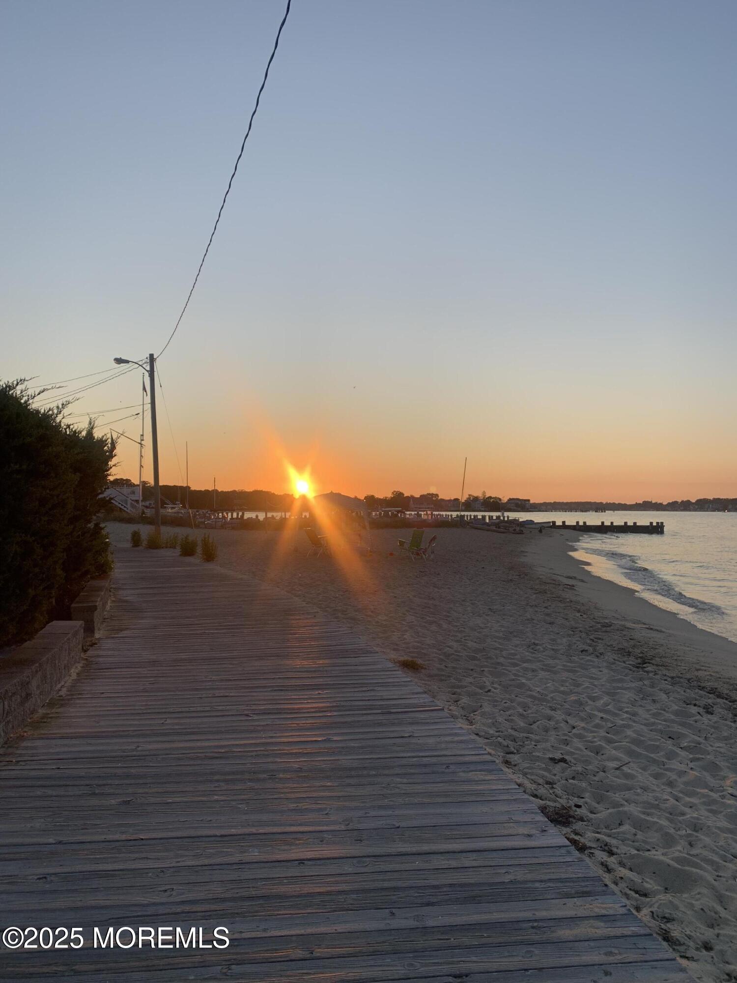 112 Ocean Gate Avenue Ocean Gate, NJ 08740 - Photo 13 of 15 a view of an ocean beach