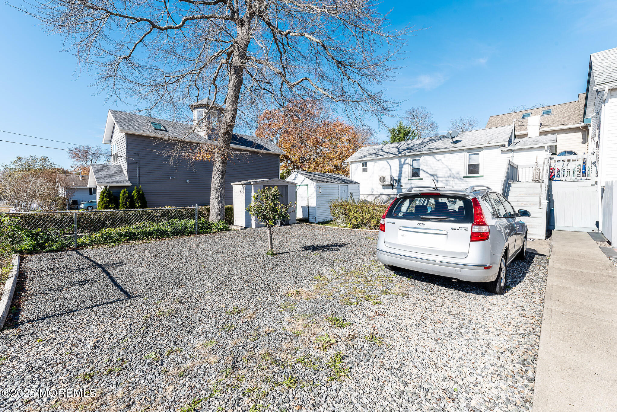 112 Ocean Gate Avenue Ocean Gate, NJ 08740 - Photo 3 of 15 a car parked in front of a building