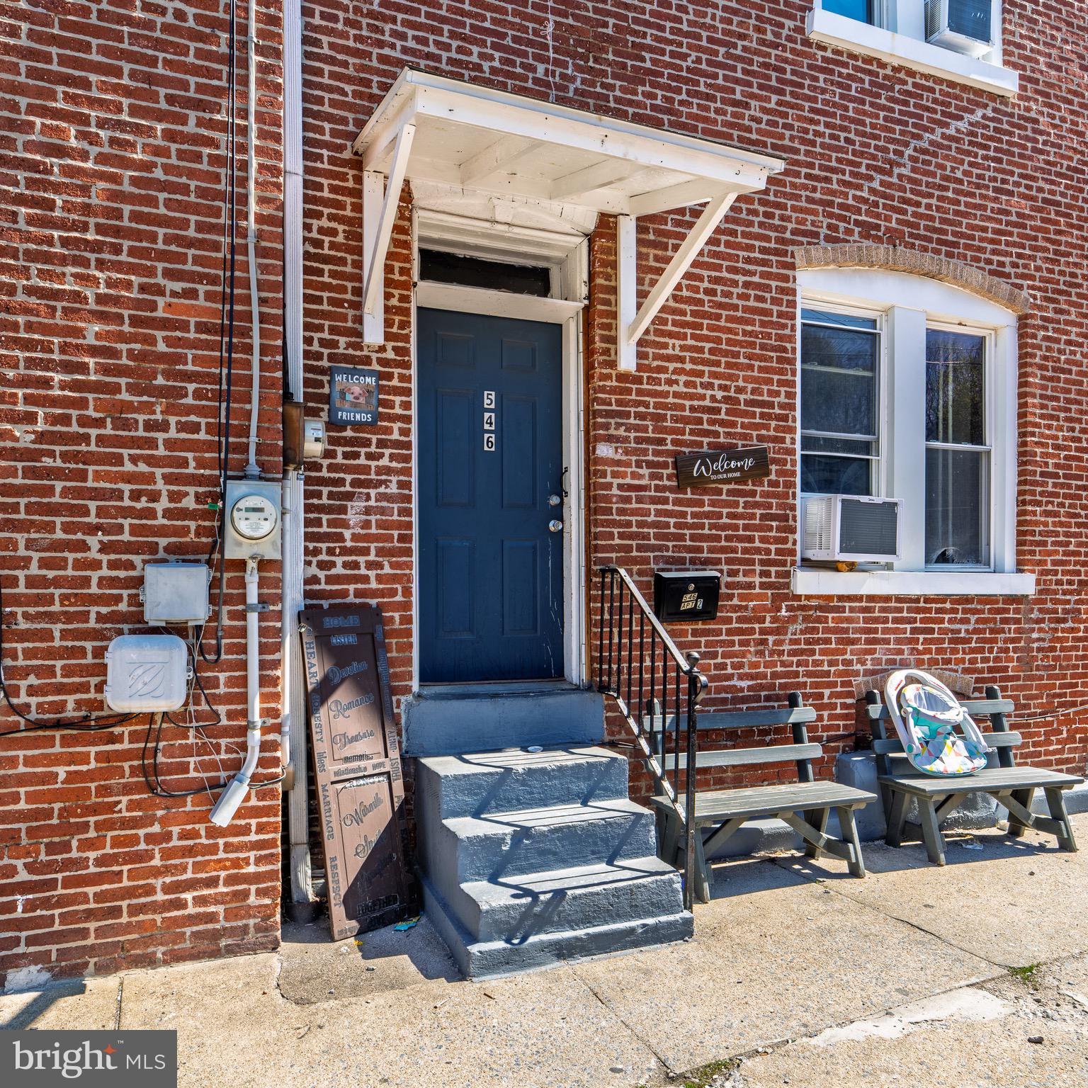 546 Poplar Street Lancaster, PA 17603 - Photo 11 of 29 a front view of a house with stairs