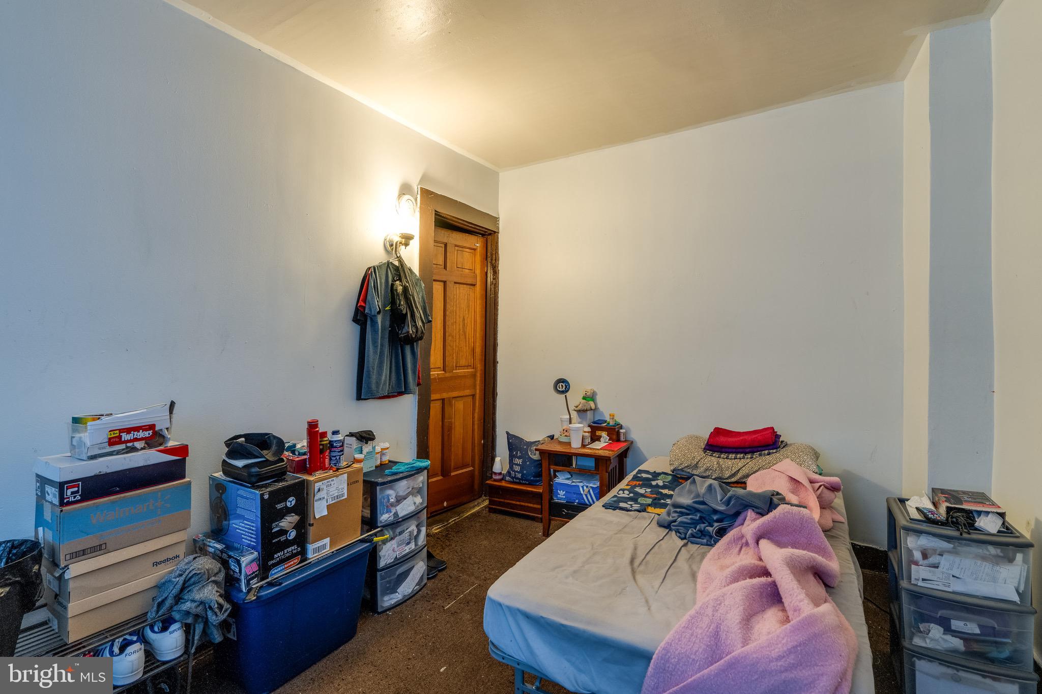 546 Poplar Street Lancaster, PA 17603 - Photo 19 of 29 a bed room with a bed and a window