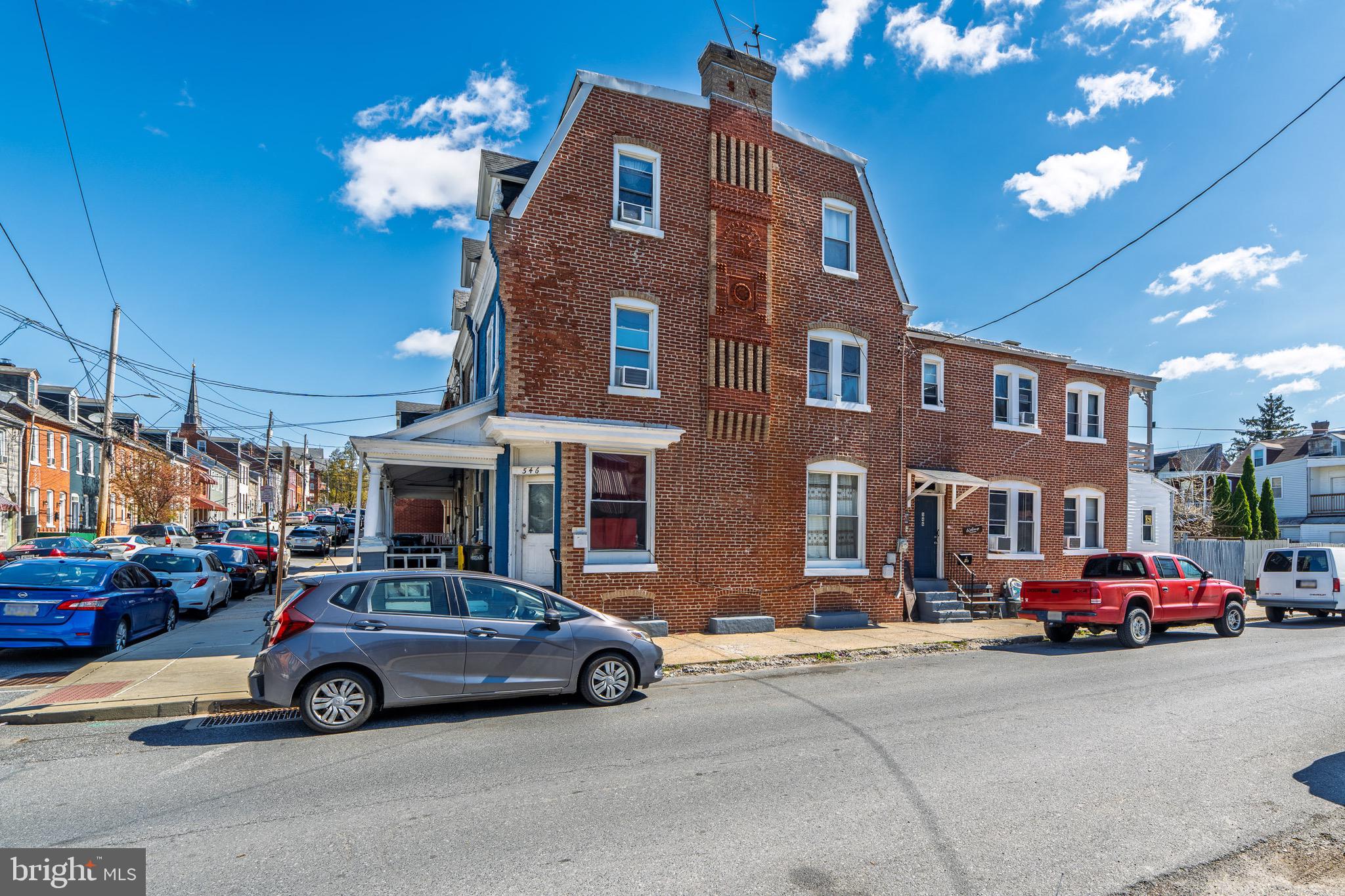 546 Poplar Street Lancaster, PA 17603 - Photo 2 of 29 a car parked in front of a building