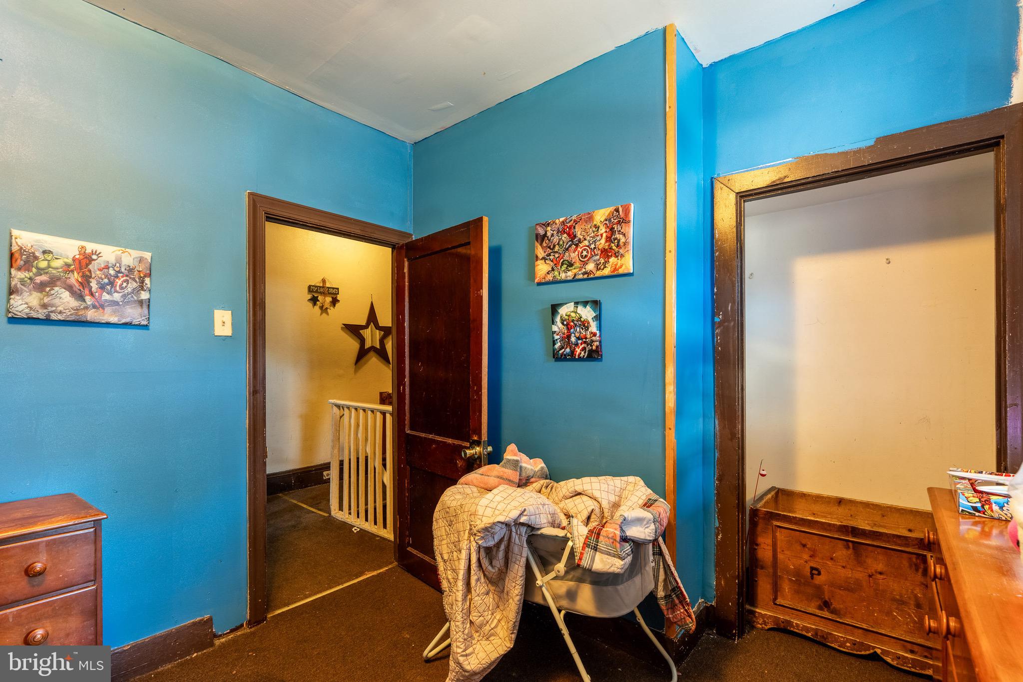 546 Poplar Street Lancaster, PA 17603 - Photo 22 of 29 a bedroom with a bed and a dresser