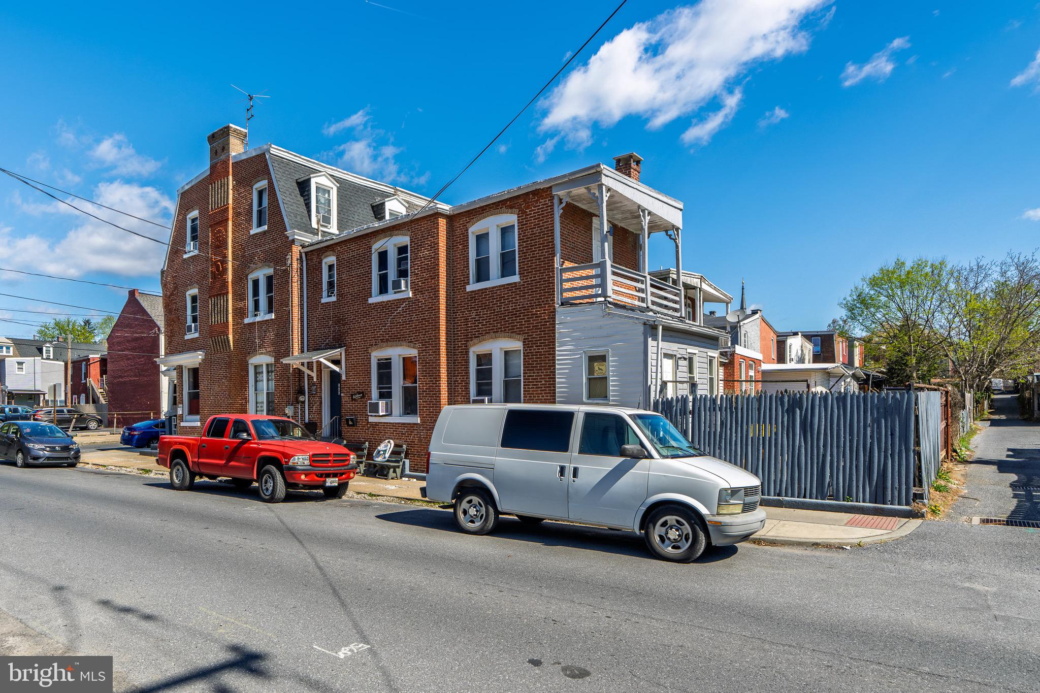 546 Poplar Street Lancaster, PA 17603 - Photo 3 of 29 a car parked in front of a house