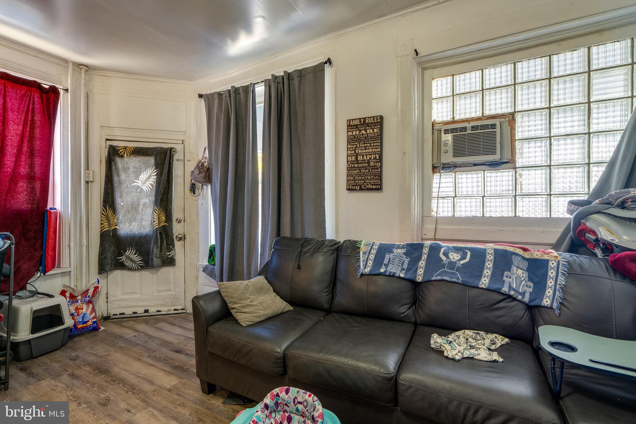 546 Poplar Street Lancaster, PA 17603 - Photo 7 of 29 a living room with furniture and a window