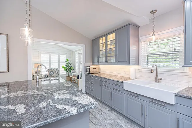a view of a dining room with furniture and a livingroom