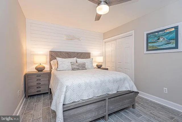 a bathroom with a mirror a sink and a shower
