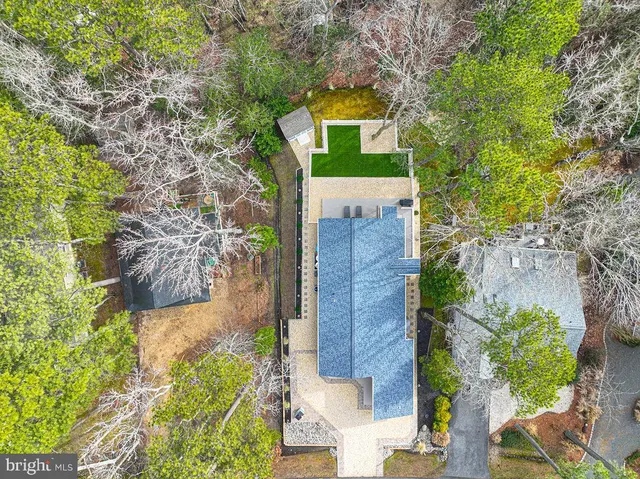 front view of a house with a trees