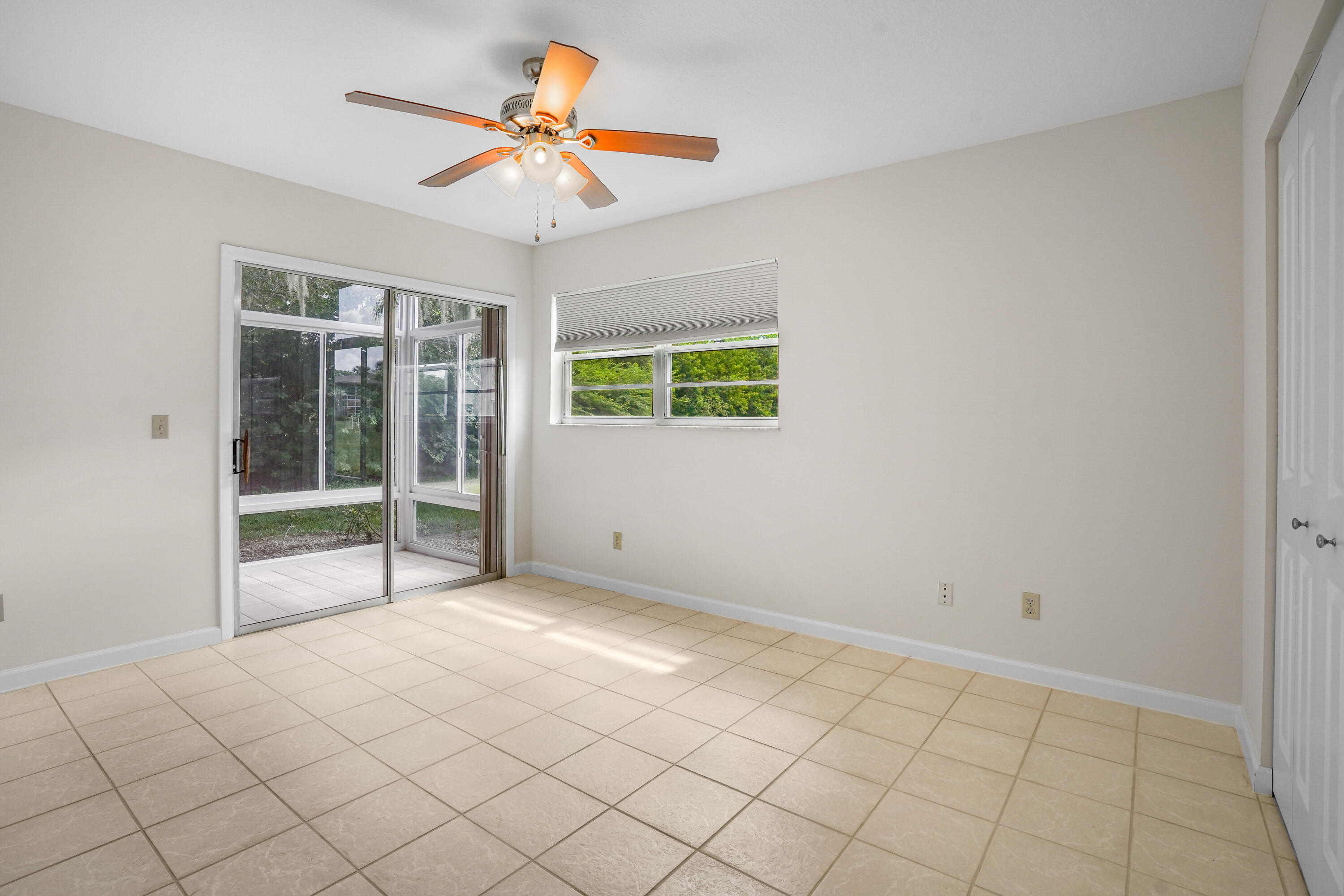 23 Lake Vista Trail, Unit 101 Port St. Lucie, FL 34952 - Photo 14 of 24 a view of an empty room with a window