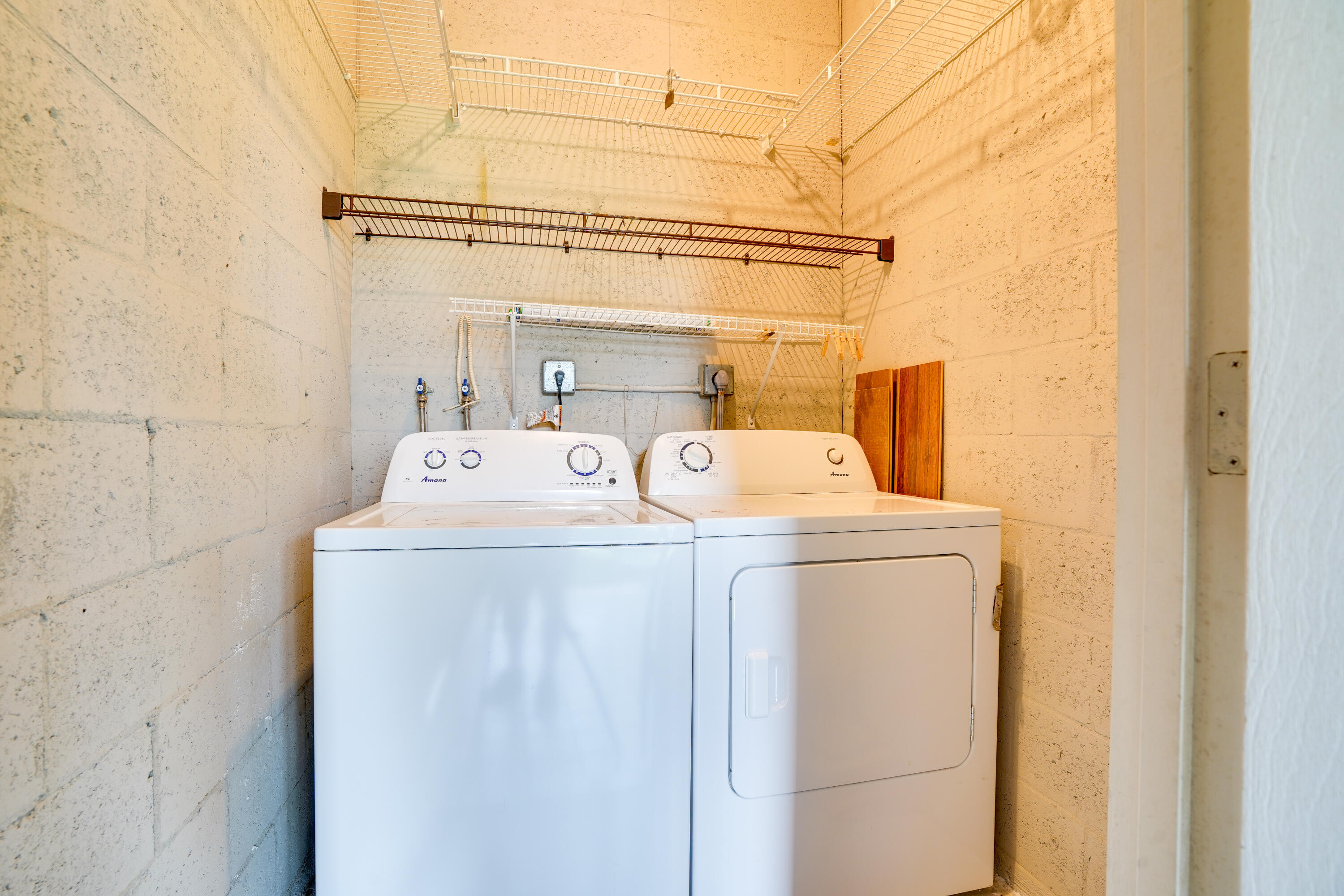 23 Lake Vista Trail, Unit 101 Port St. Lucie, FL 34952 - Photo 22 of 24 a utility room with dryer and washer